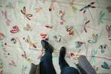 Close-up of the Pakistani Mixed Weave Kilim rug's vibrant dragonfly pictorial design.