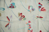 Mixed weave pictorial kilim detail with raspberry, turquoise, and saffron dragonfly motifs.