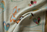 Detail of Pakistani pictorial Kilim, showing its plain woven texture and colorful embroidered dragonflies.