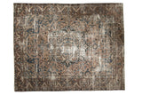 Vintage Distressed Bakhtiari carpet, oversized medallion, scrolling florals in faded beige and blue.