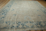 Distressed Gorevan carpet, worn ivory field with faded blue geometric motifs and continuous Samovar border.