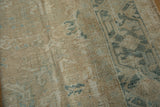 Textured pile of vintage distressed Gorevan, with mostly even wear and exposed foundation.
