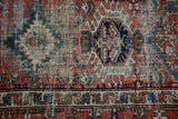 Antique Karaja rug detail: visible foundation wear, geometric motifs, brick red, indigo, ivory.
