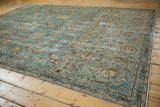 Distressed vintage Tabriz carpet section with dusty aqua field, beige palmette vinery, and narrow border.