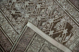 Distressed vintage Caucasian runner pile and woven back, revealing brown, silver, mauve patterns.
