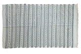 Vintage Moroccan Kilim rug featuring striated patterns, ivory and charcoal tones, 4'8
