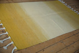 Saffron yellow Moroccan Rag Rug design with thick white braided fringe.