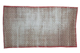 Vintage Turkish Sparta fragment rug, ivory field with time-softened red and charcoal scalloped lattice, 4'1