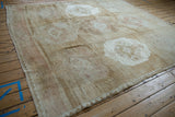 Vintage distressed Kars rug's intact side selvage with muted chevron border.