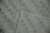 Distressed vintage Sparta rug pile showing lattice pattern, wear to knot heads, and foundation.