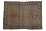 Antique Afshar rug with triple diamond medallions, zigzag field in camel and navy tones, 4'5