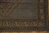 Afshar rug corner: blue, camel geometric border, diagonal main field pattern, tattered edge.
