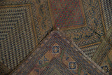 Fine hand-knotted Persian Afshar rug corner revealing zigzag field patterns and aged fringe.