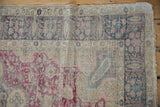 The back of a vintage Turkish Kaisary rug showing its hand-knotted foundation.