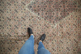 A personal perspective on the Herati design and stepped medallion of an antique Doroksh rug.