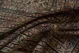 The soft, velvety pile of an antique Doroksh carpet showing a time-softened color patina.