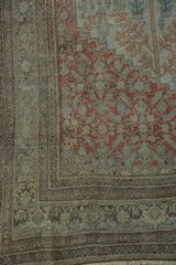 Antique Distressed Bijar rug corner showing Herati motif field and Samovar Boteh border.