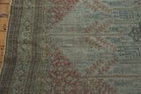 Antique Bijar carpet with charcoal Samovar Boteh border and time-softened terracotta field.