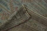Distressed antique Bijar carpet corner showing low pile, faint foundation, and dark Samovar Boteh border.