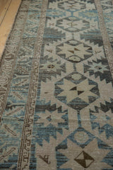 Vintage distressed Northwest Persian runner with serrated motifs, leaf border, and soft patina.