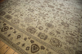 Dense wool pile of Egyptian Agra carpet, highlighting beige and brown floral and lotus motifs.