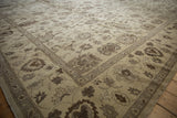 Traditional Egyptian Agra carpet border showcasing beige, silver, and chocolate floral patterns.