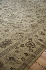 Vintage Egyptian Agra carpet corner: beige field, oxidized silver floral border, and fringe.