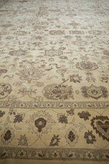 Hand-knotted Egyptian Agra rug detail: dense floral field and border in beige and brown tones.