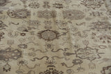 Dense Egyptian Agra carpet pile with floral cross-sections, lotus flowers, and cloudbands in beige, silver, brown.