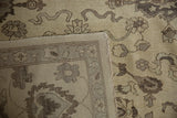Intact original side cord selvage and dense hand-knotted foundation of the beige Egyptian Agra rug.