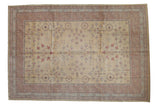 Romanian Khotan carpet, dusty gold field, pomegranate plants in pale red, mauve, silver.