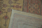 Hand-knotted foundation, fringed edge, and dusty gold Khotan design pattern.