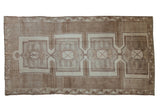 Vintage Turkish Kars carpet with heavily abrashed field, geometric palmette medallions, inverted floral border, 7' x 13'.
