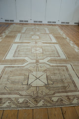 Vintage Kars carpet's geometric palmette and tonal floral leaf border in ivory and beige.