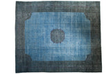 Distressed overdyed Persian Khorassan carpet, sky blue field with roundel medallion, teal violet rose border.