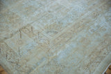 Distressed vintage Persian Mahal carpet showing heavy pile wear and visible foundation.