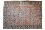 Distressed vintage Persian Mahal carpet, allover faded rose field, blue palmettes, and teal border.