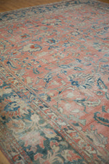 Distressed Mahal rug's faded rose field, revealing blue vinery and subtle foundation.