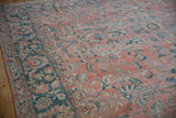 Distressed rose and dusty teal palmettes with vinery on a vintage Mahal.