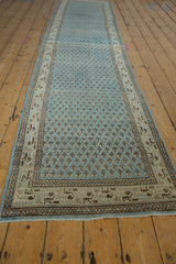 Distressed vintage Mir Sarouk runner with worn pale blue boteh field and ivory Serbend border.