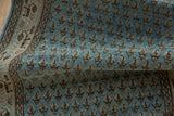 Distressed pile texture of pale sky blue Mir Sarouk runner, showing repeating botehs and partial border.