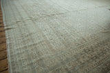 Allover Herati design motif on Indian Bijar rug, featuring ivory, silver, and dusty beige abrashes.