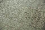 Vintage Indian Bijar carpet detail: muted Herati pattern, softened pile, and striped border.