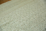 Herati design motif on vintage Indian Bijar rug, with even wear in ivory, dusty beige, and slate blue.