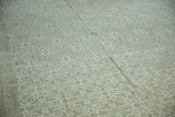 Vintage Indian Bijar rug's intricate Herati pattern with even wear in ivory, silver, and beige.