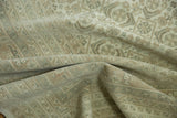 Hand-knotted Indian Bijar rug pile showing muted ivory, beige Herati design and wear.