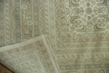 Vintage Indian Bijar rug fold reveals tightly woven foundation, fringes, and muted Herati design.