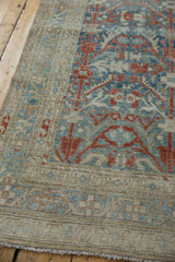 Detail of the Persian Hamadan runner's side cord selvage and intricate floral border design.