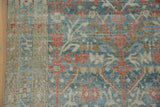 Intact side cord and worn pile with visible knot heads on a distressed Persian Hamadan rug.