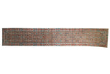 Vintage distressed Persian Hamadan runner with an allover Herati design in muted coffee, cinnabar, and turquoise.